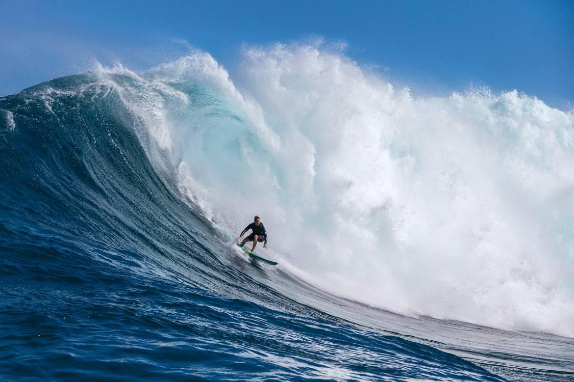Construction, house painting, organic gardening—dropping into Pe‘ahi bombs. All in a day for Paige Alms. Haiku, Hawaii. 