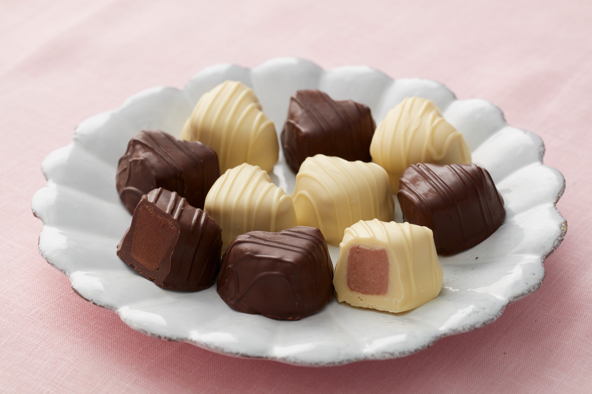 Important Truffle News: You loved these Valentines Day truffles so much, we’re adding them to the year-round truffle fam! 😍 Which one has your heart, Deep Dark Chocolate or Strawberry Truffle? 🍫🍓 #TruffleTuesday