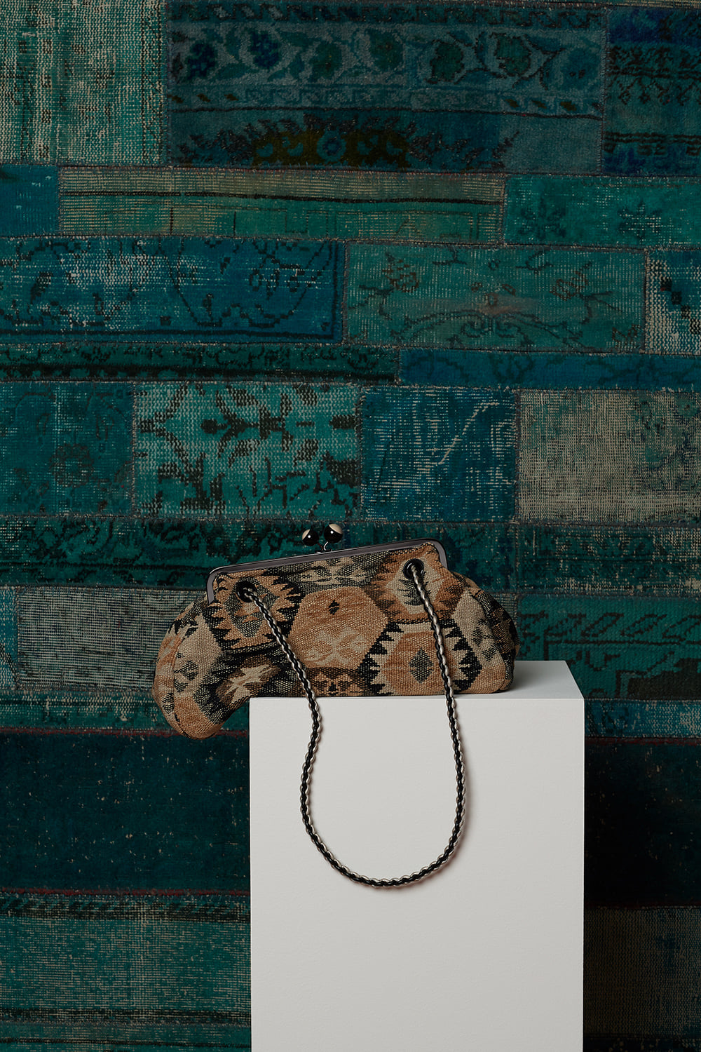 Furnished in rich tapestry, the new Pasticcino Bag is a work of art. find it in-store and online