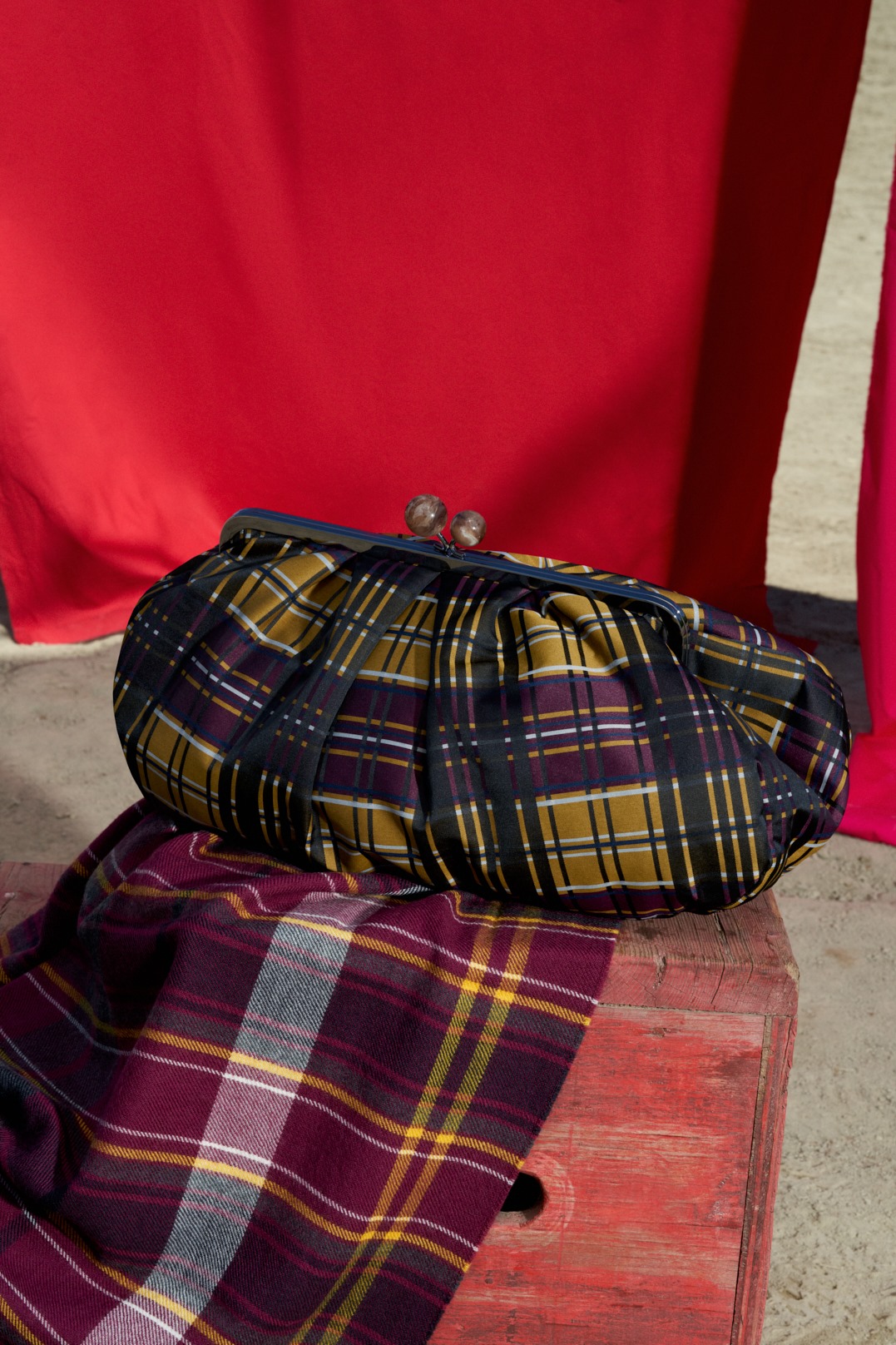 Meet the ultimate Pasticcino Bag for autumn: jacquard tartan fabric add a touch of personal charm to everyday style.