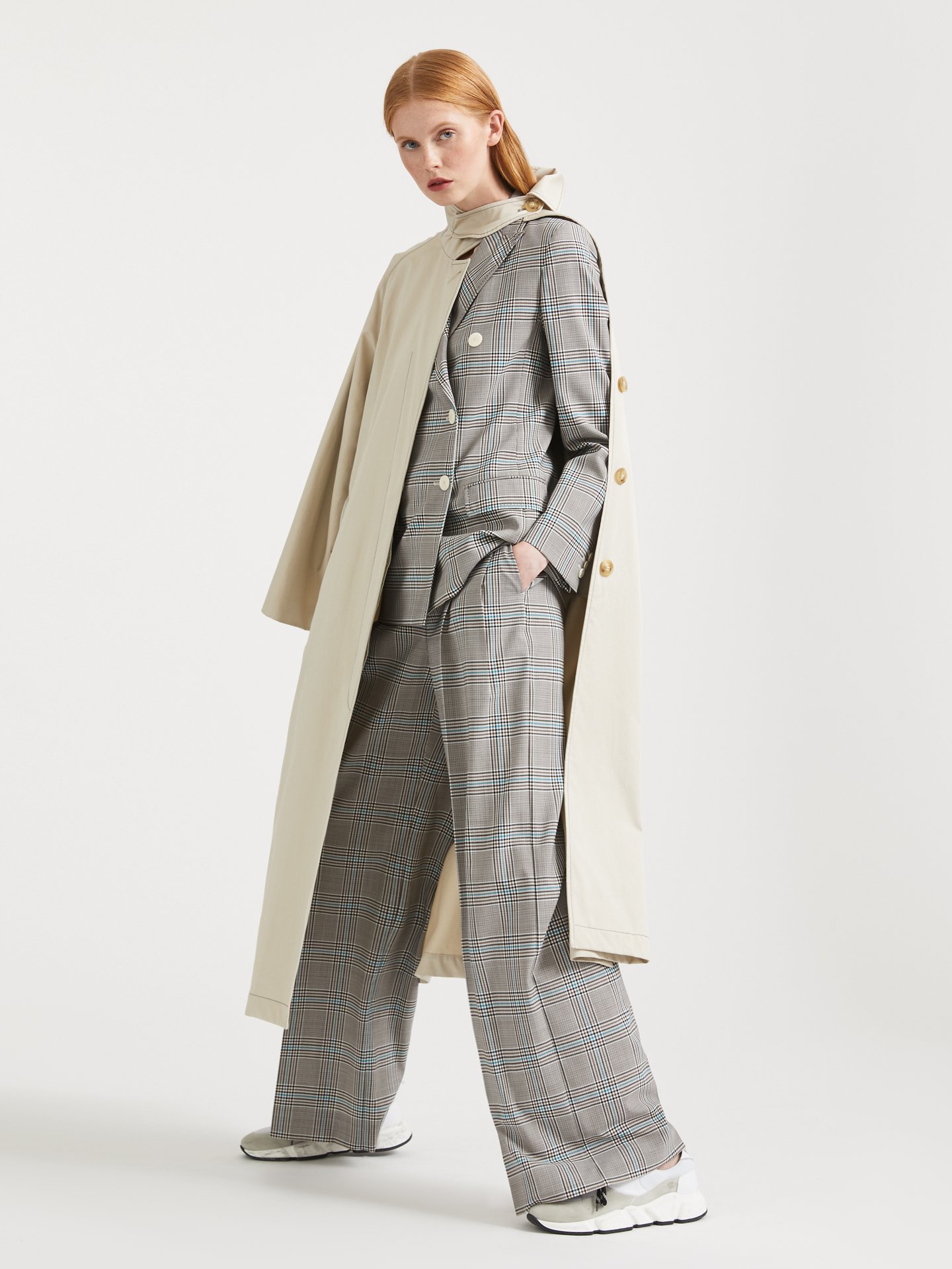 Relaxed suiting meets the modern trench coat - a fresh take on tailoring fit for any season. Anchor this easygoing look with sleek trainers. Discover the new Spring Summer 2020 collection in-store and online. 