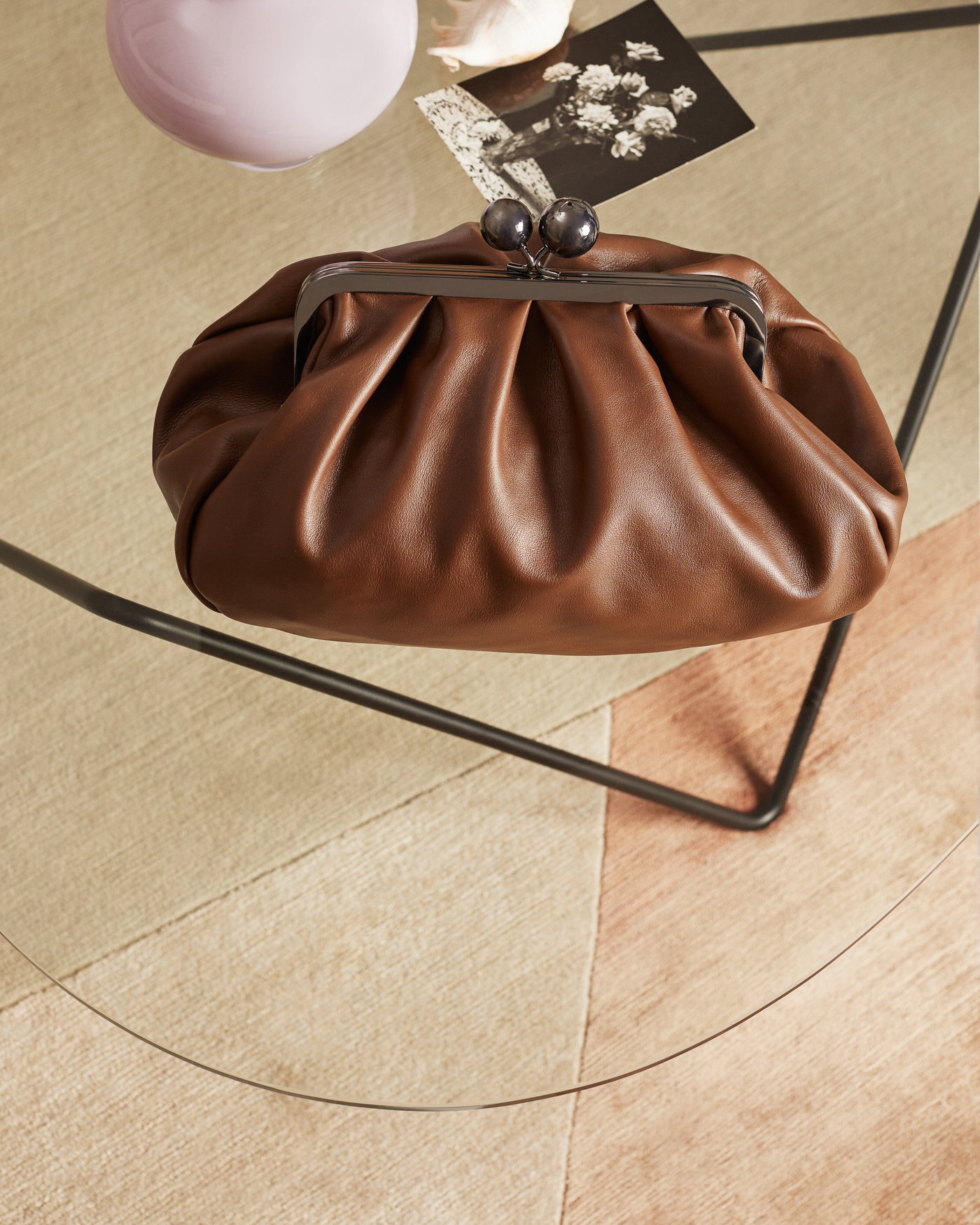 The chocolate brown passepartout. Rich and tasty, a Pasticcino Bag never shies away. See more