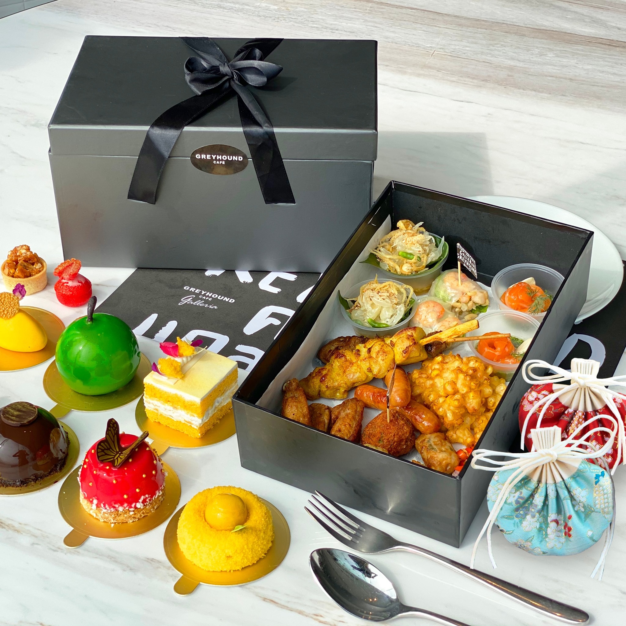 Belated Happy New Year!🎉 Anticipating a prosperous and stressless2️⃣0️⃣2️⃣1️⃣ahead for everyone, Greyhound Cafe Galleria is launching her New Year Tea Fortune Box🎀 which consists of an array of mouth-watering sweet treats and signature savouries!