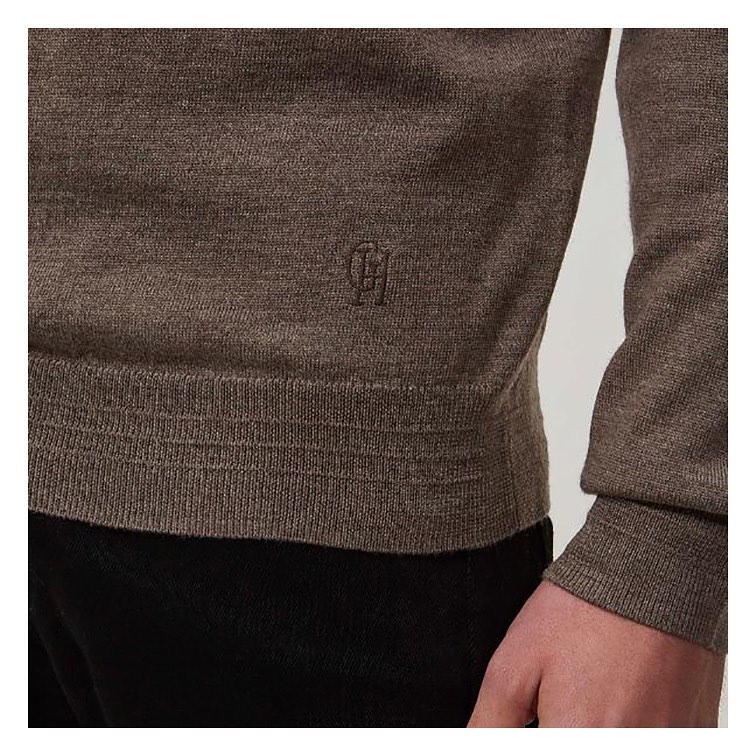 A practical alternative to a rollneck, this modern quarter-zip sweater was made in London from the finest Italian merino yarn.