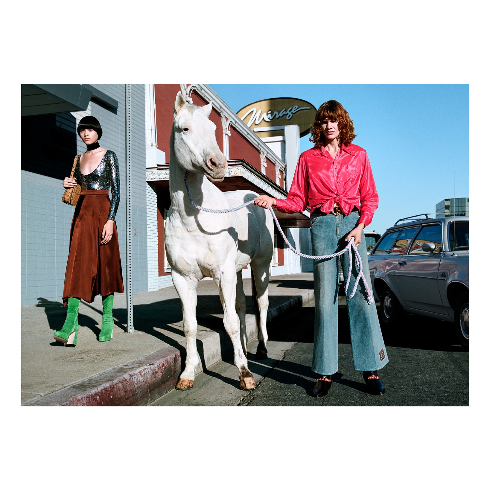 Looks from Gucci Spring Summer 2020 appearing in the new advertising campaign Of Course A Horse include flare denim pants styled with a silk shirt and a midi skirt worn with a sequin long sleeve top. Discover more on.gucci.com/2020_. 