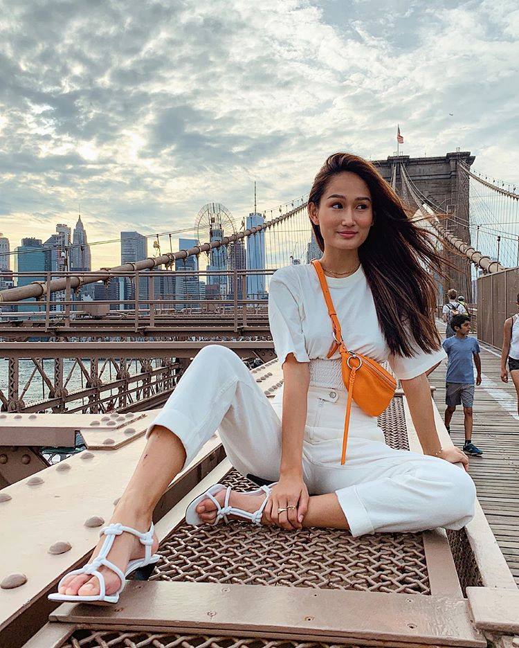 Great view, even cuter outfit. @Prettyfrowns shows us how to nail the vacation gram. Bonus: Her top's on sale! Clio Top: festivalwalk