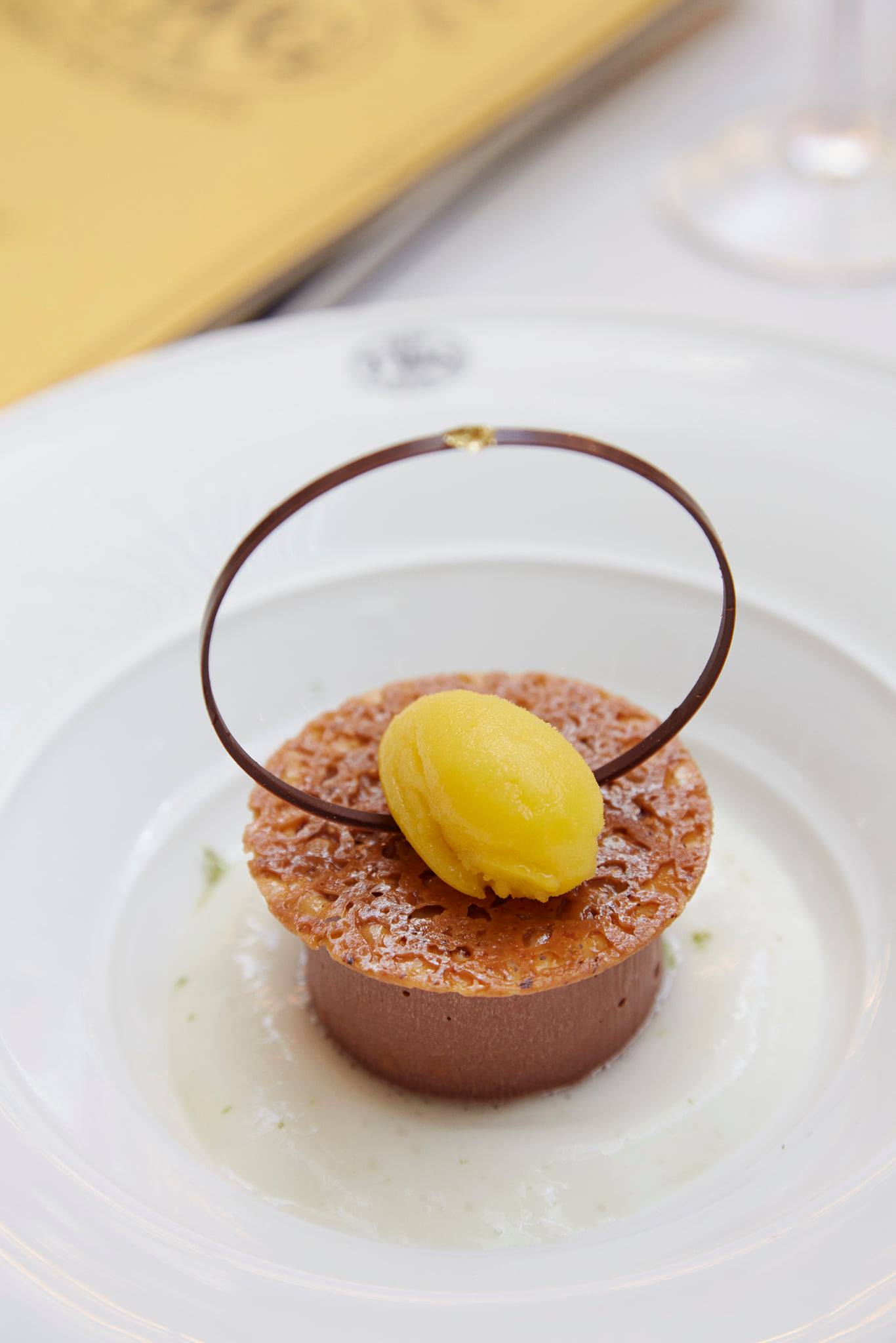 A great midweek treat, Earl Grey Fortune infused chocolate moussed topped with a hazelnut tuile and a scoop of mandarin sorbet, served with yuzu foam. Available this week at any TWG Tea Salons in Singapore.