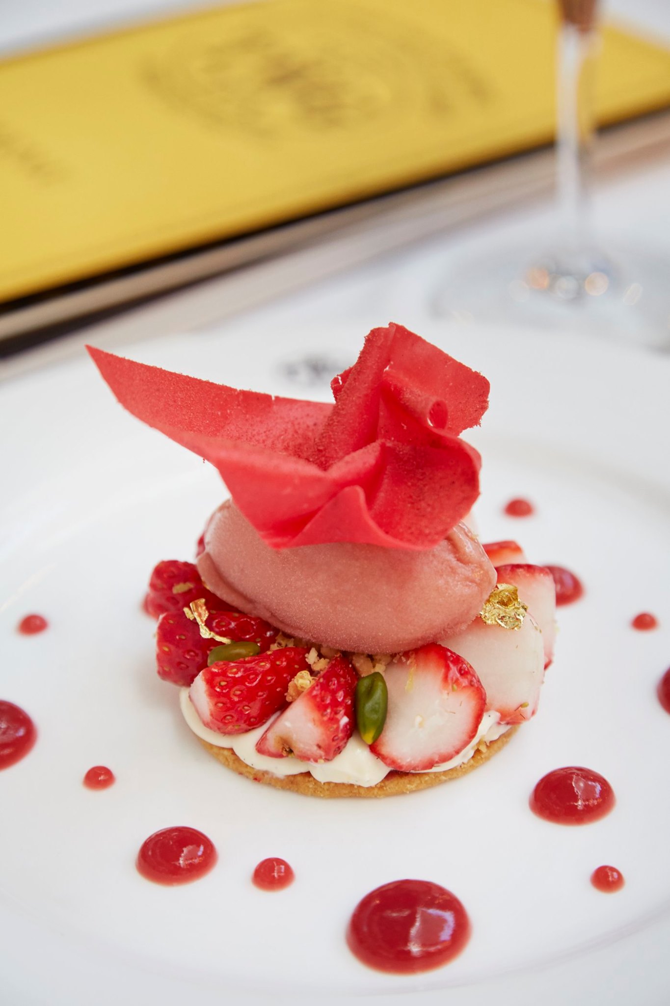 Pamper yourself with TWG Tea strawberry pistachio nut tart with mille-feuille cream and Silver Moon Tea infused strawberry jam, topped with a strawberry tuile and accompanied by a scoop of rhubarb sorbet. Available at any TWG Tea Salons in Singapore.
