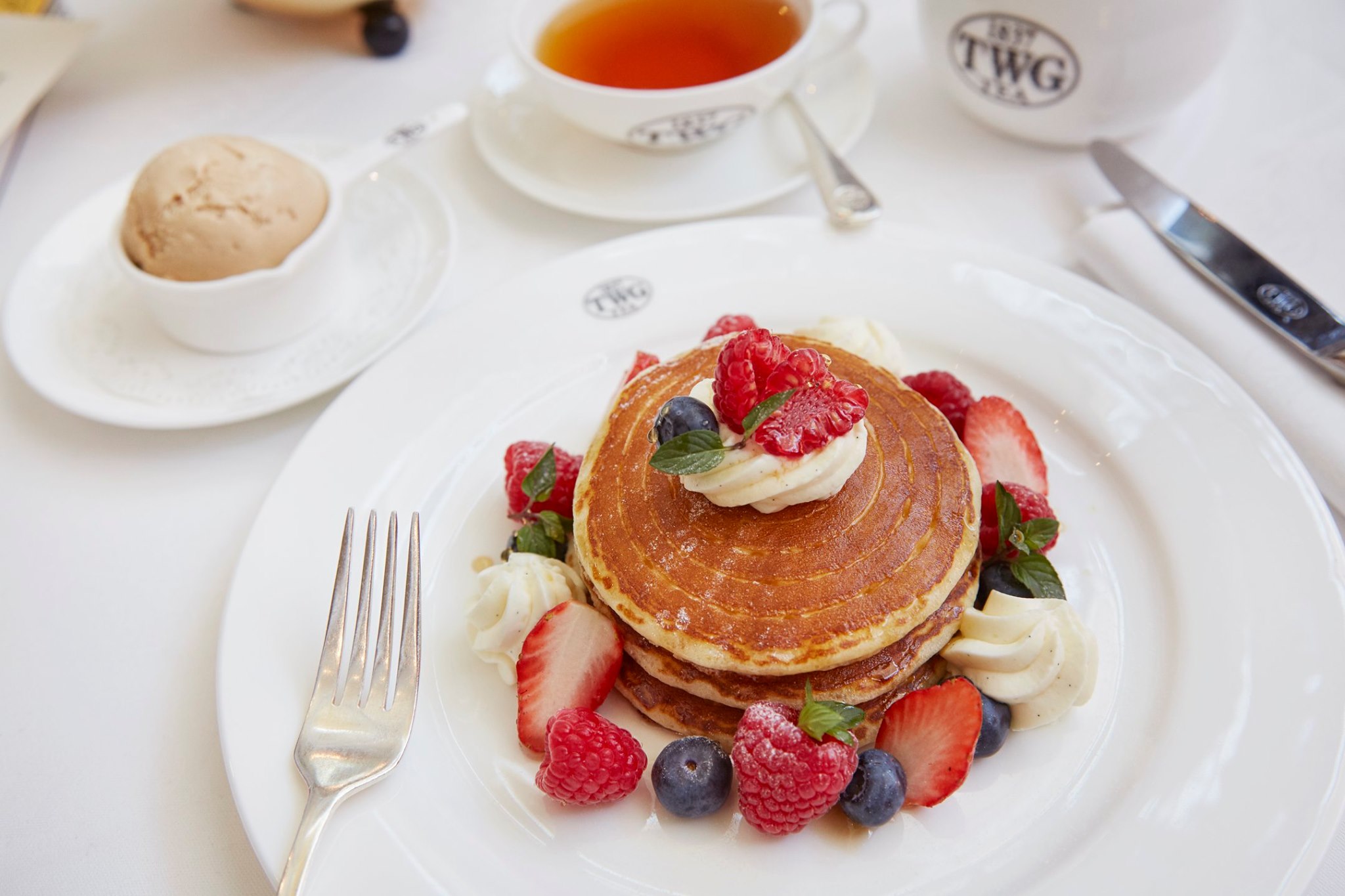 Pancakes accompanied by fresh berries, vanilla Chantilly cream and maple syrup, served with choice of one scoop of Vanilla Bourbon Tea ice cream or 1837 Black Tea sorbet.