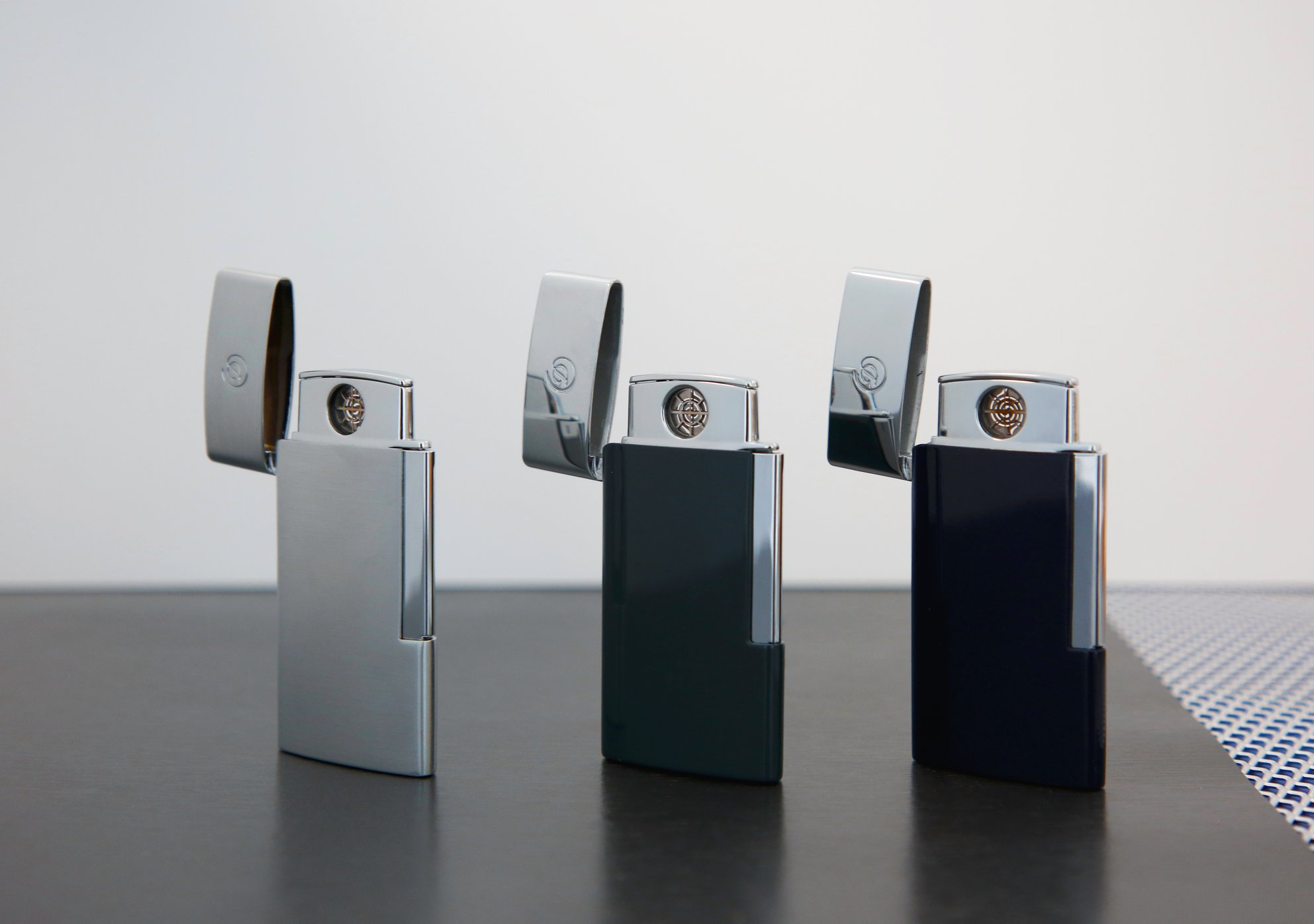 “Eslim” the electric lighter that fits our times and fits your life. Brushed chome, grey or dark-blue, which one would you choose?