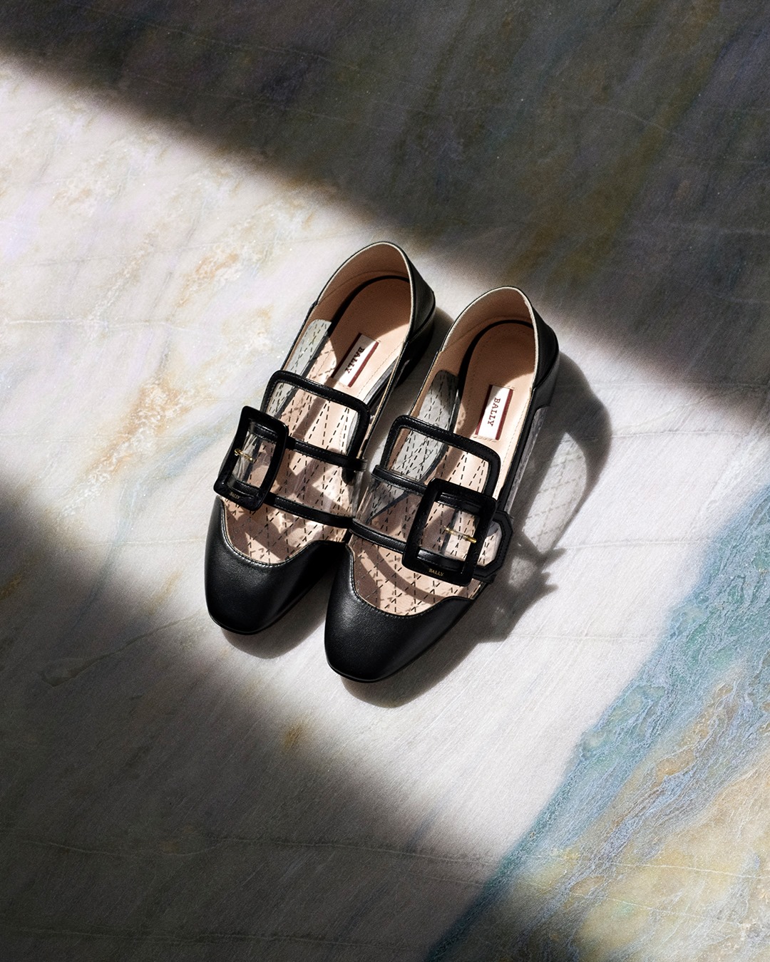 See through. A playful take on the classic Bally Janelle flats.