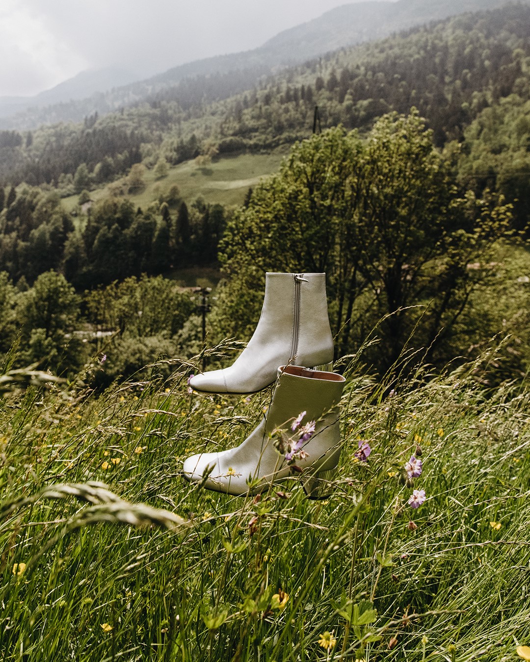 Walking on air. The Emme boots get a fresh and playful update in silver.