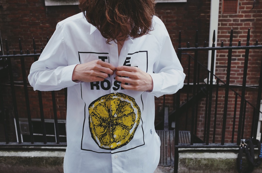 Our Kent & Curwen X The Stone Roses Capsule Collection white cotton shirt, created in partnership with the band, is a wearable statement piece reminiscent of the 90's era and iconic British music.