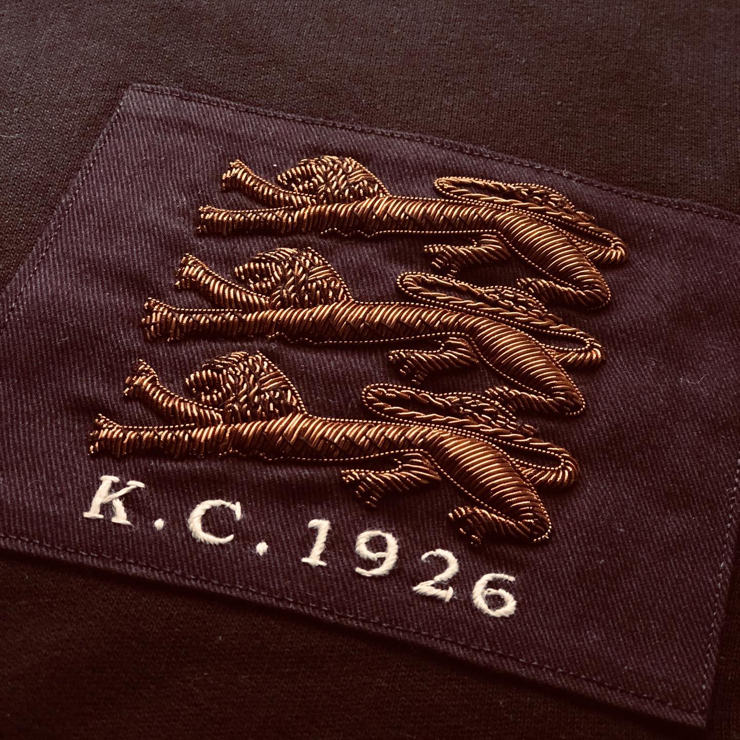 Three lions, our historic emblem in bullion metal thread featured on a reissue of our vintage wash black sweatshirt.