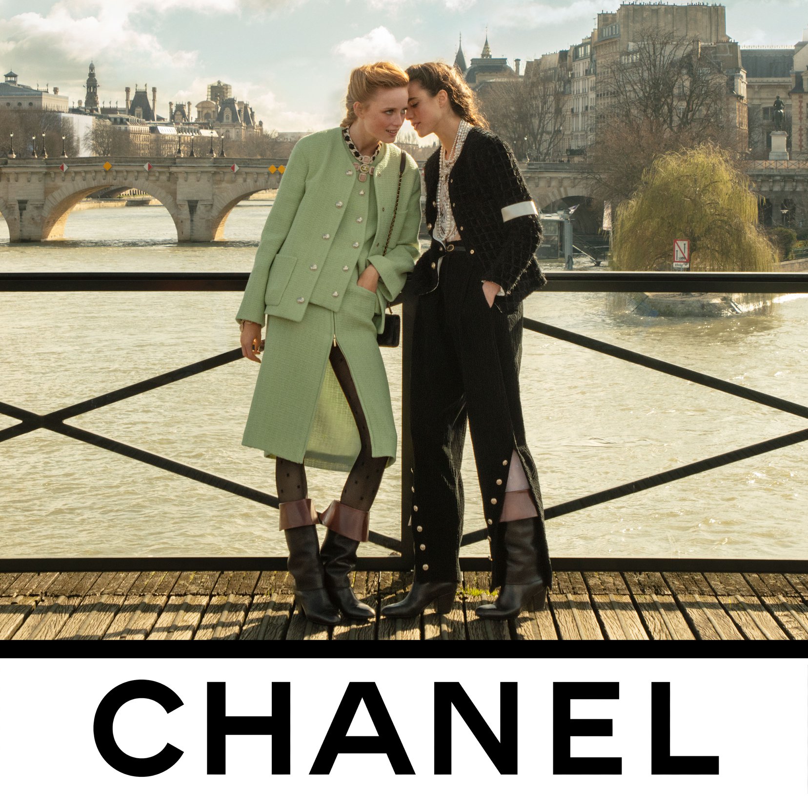 Rianne Van Rompaey & Margaret Qualley on the Pont des Arts in Paris wearing the Fall-Winter 2020/21 Ready-to-Wear collection.