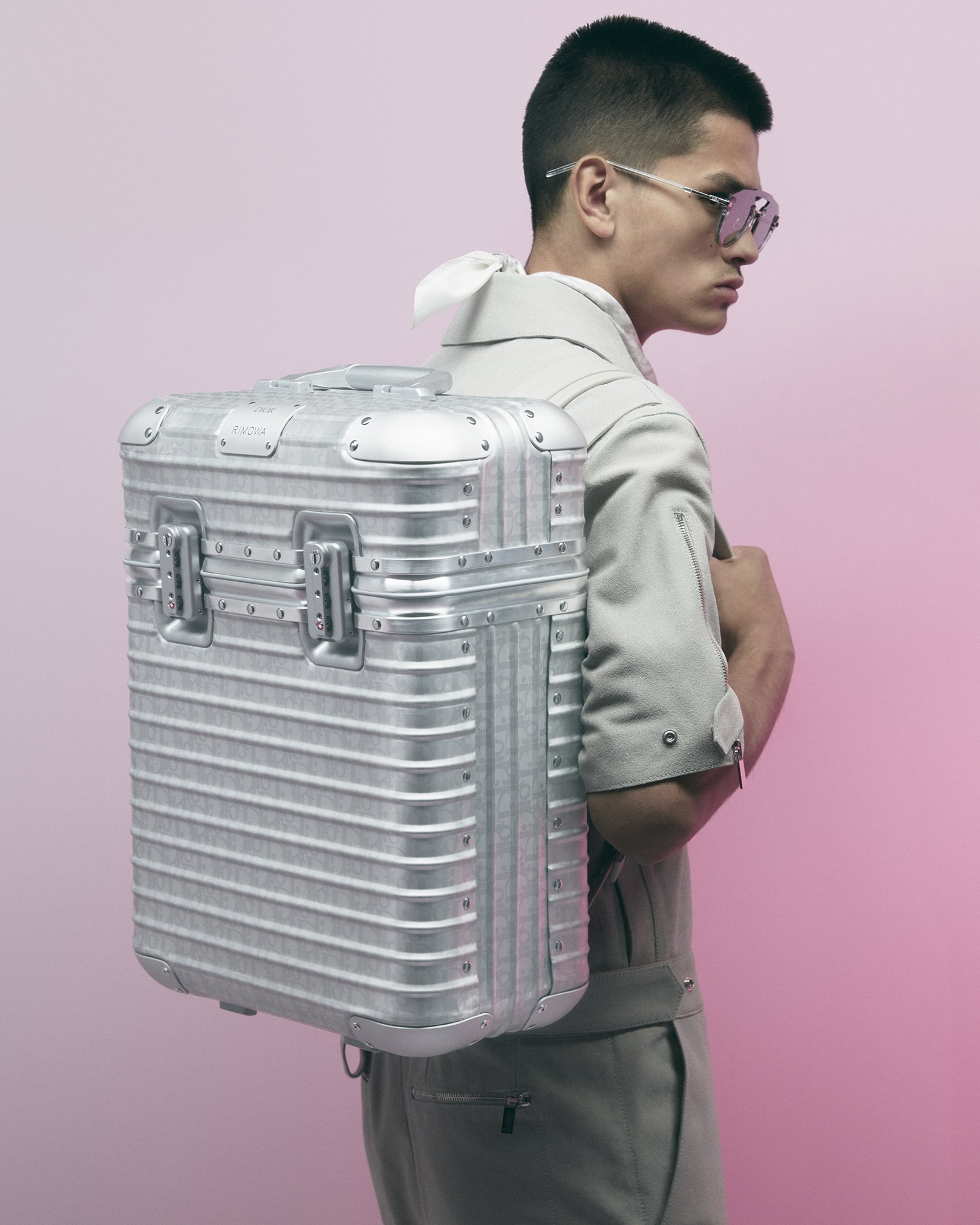 The Dior Summer 2020 men's show by Kim Jones, the Creative Director of Dior men's collections, unveiled a unique capsule collection done in collaboration with the luxury luggage brand Rimowa, featuring special-edition products such as a backpack or a champagne case. This collection features the 'Dior Oblique' signature inscribed directly onto the German brand's iconic aluminum skin. Discover more about the collection on.dior.com/summer20!
