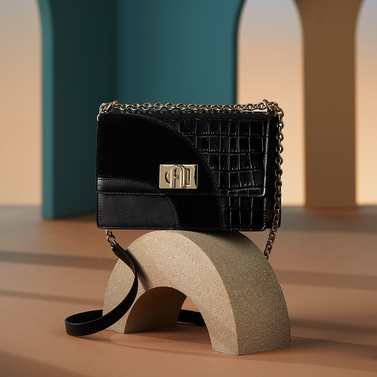 Get inspired by the Furla 1927 Mini Crossbody's sleek yet glossy approach.