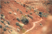 Surfing contour lines on Pipe Dream Trail, Moab, Utah