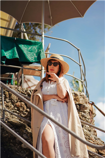 Just like a Hollywood diva Nunzia Cillo chooses to wear the iconic camel trench coat over our white maxi dress during #pennyblackholidays. Très chic! Trench coat >> bit.ly/2VejNfB