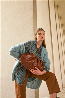 A perfect wardrobe update of neutral tones, geometric patterns and wear-with-all knits has arrived. Complete your look with our timeless Pasticcino Bag in-store and online