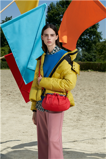 The padded coat in paintbox-bright yellow leads the colour-block mood of the moment. Discover more 
