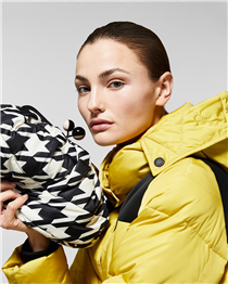 From puffer jackets to the Pasticcino Bag, padded nylon gets painted and printed every which way to style out plummeting temperatures. 