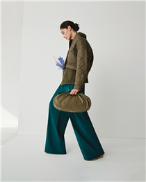 This season's nature -inspired hues usher in a tonal take on dressing, completed with the new leather Pasticcino Bag.