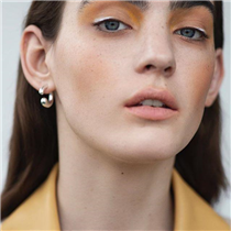Beautiful Agnes Anjou Olofsson in ELLE DK  wears our Mercy earrings in an  inspirational beauty shoot. The Mercy collection is designed by Jacqueline Rabun  Explore the collection at: festivalwalk Foto: Marco van Rijt