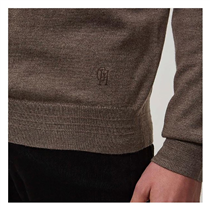 A practical alternative to a rollneck, this modern quarter-zip sweater was made in London from the finest Italian merino yarn.