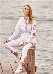 Matching white wash two-pieces with striking regatta graphics add an edge of nautical to your look. Make it yours.