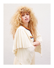 Featured in Violet, Natasha Lyonne wears a dress with pleated skirt and sleeves from Gucci Pre-Fall 2019 by Alessandro Michele. 