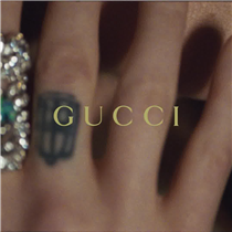 Close to Florence Welch with glimpses of jewels in the designs she wears of the Gucci High Jewelry collection Hortus Deliciarum by Alessandro Michele. A white gold bracelet with a blue tourmaline in a lion’s mouth, other pieces with a heart and arrow gleaming with blue sapphires. Filmed in Paris by Laura Jane Coulson the singer, songwriter and poet appears in a short film featuring the jewelry collection, launching soon. 