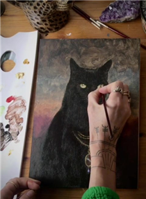 An artist and her cat, featuring Alex Merry