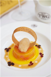 Dive into TWG Tea grapefruit and orange gelée served with a French Earl Grey infused nage and a scoop of French Earl Grey sorbet, topped with an almond tuile. Available on this week's Set Menu at all TWG Tea Salons in Singapore.