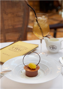 This week's menu dessert is Earl Grey Fortune infused chocolate mousse topped with a hazelnut tuile and a scoop of mandarin sorbet, served with yuzu foam. Available at any TWG Tea Salons in Singapore.