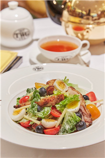 Plan a healthy meal by having TWG Tea crisp chicken thigh infused with Smoky Earl Grey on a bed of Romaine lettuce tossed in a parmesan and garlic dressing served with quail eggs, cherry tomatoes, Comté cheese sticks and blueberries. Available at any TWG Tea Salons in Singapore on this week's set menu.