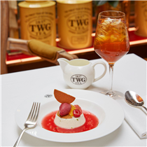 A well deserved treat, vanilla panna cotta topped with a scoop of 1837 Black Tea sorbet, almond tuile, grapefruit and orange segments, served with a raspberry sauce and sago pearls. Indulge with us at any TWG Tea Salons in Singapore.