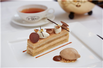 Apple caramel mousse cake with roasted hazelnuts topped with Jivara chocolate mousse and vanilla Chantilly cream served with caramel sauce and a scoop of Napoleon Tea ice cream on this week's set menu. Available at all TWG Tea Salons in Singapore.