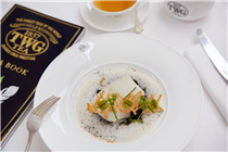 Toothfish fillet steamed with white wine and garlic accompanied by beluga lentils infused with Sencha Prestige, served with wilted sweet potato leaves, a hazelnut butter emulsion and garlic chips.
