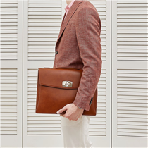 Designed to carry more than just a laptop, “Line D” briefcase is functional yet classy and timeless: