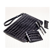 The Croco Dandy clutch is a perfect choice for business trip. Crafted from black croco-effect leather, this stylish clutch features a detachable leather wrist strap for convenient carrying and is fastened with a zip.