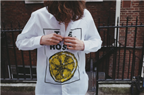 Our Kent & Curwen X The Stone Roses Capsule Collection white cotton shirt, created in partnership with the band, is a wearable statement piece reminiscent of the 90's era and iconic British music.