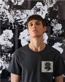 Our Classic jersey t-shirt cut from soft mélange cotton in dark grey, finished with a signature woven tonal rose patch.