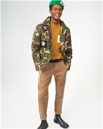 This season’s signature Army Field Jacket in camouflage with a selection of house badges . This versatile and unique piece gives a nod to our military tradition and heritage. Pair it with our mustard colour mélange rose patch jumper to brighten up your winter wardrobe.