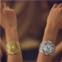 The Aigle Cambon cuffs are rich with CHANEL iconography. Cuffs, usually one on each wrist, were a favorite jewelry style of Gabrielle Chanel. The double-headed eagle was inspired by the mirror in her Rue Cambon apartment, with the same, double-headed eagle perched aloft. Discover the collection on chanel.com/-themuses. 