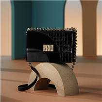 Get inspired by the Furla 1927 Mini Crossbody's sleek yet glossy approach.